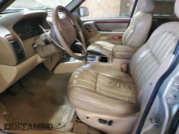 1999 Jeep Grand Cherokee Limited with VIN 1J4GW68N3XC799663, listed as a Copart auction lot 45630695 with 149,125 mi miles and Salvage Title. Bid and sale history available at carsss.com. Image 7.