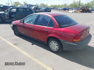 1996 Saturn SL with VIN 1G8ZG5289TZ214790, listed as a IAAI auction lot 42090262 with 197,485 mi miles. Bid and sale history available at carsss.com. Image 3.