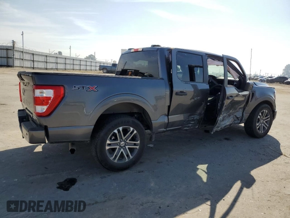 2023 Ford F-150 XL with VIN 1FTEW1CP4PKD21685, listed as a Copart auction lot 54992615 with 27,252 mi miles and Salvage title. Bid and sale history available at DreamBid. Image 3.