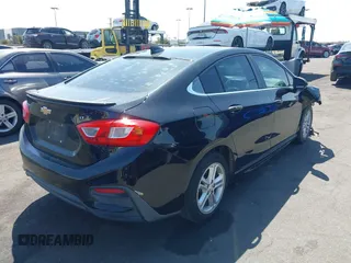 2017 Chevrolet Cruze LT with VIN 1G1BE5SM0H7266072, listed as a IAAI auction lot 41976470 with 139,723 mi miles and . Bid and sale history available at DreamBid. Image 4.