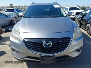 2014 Mazda CX-9 Grand Touring z VIN JM3TB3DV9E0437380, wystawiony jako IAAI lot #42298066 z przebiegiem 169 644 mil mil oraz . Historia ofert i sprzedaży dostępna na DreamBid. Obrazek 12.