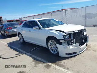 2011 Chrysler 300 with VIN 2C3CA6CTXBH559626, listed as a IAAI auction lot 41876062 with 112,045 mi miles. Bid and sale history available at carsss.com. Image 1.