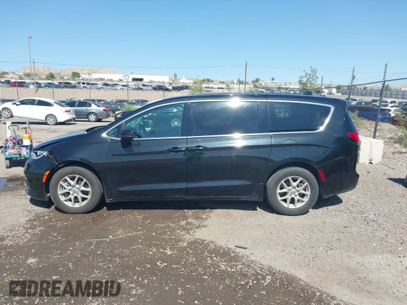 2023 Chrysler Pacifica Touring L with VIN 2C4RC1BG9PR628170, listed as a IAAI auction lot 42515590 with 41,987 mi miles and . Bid and sale history available at DreamBid. Image 14.