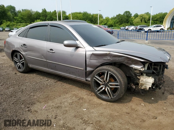 2006 Hyundai Azera SE with VIN KMHFC46F46A105028, listed as a Copart auction lot 59569815 with 219,201 mi miles and Salvage title. Bid and sale history available at DreamBid. Image 4.