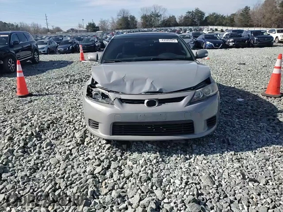 2012 Scion tC z VIN JTKJF5C78C3040542, wystawiony jako Copart lot #43595925 z przebiegiem 160 106 mil mil oraz Szkoda całkowita • Salvage title. Historia ofert i sprzedaży dostępna na DreamBid. Obrazek 10.