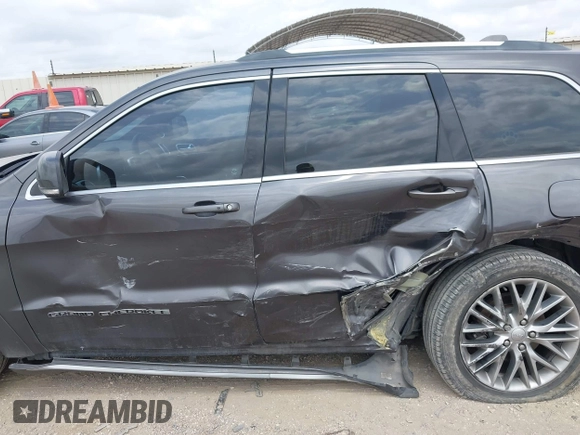 2018 Jeep Grand Cherokee Summit with VIN 1C4RJFJT2JC280973, listed as a IAAI auction lot 42083926 with 82,189 mi miles and . Bid and sale history available at DreamBid. Image 14.