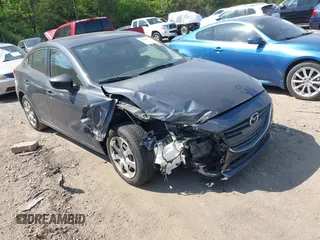 2015 Mazda 3 i Sport with VIN 3MZBM1U79FM173285, listed as a IAAI auction lot 42049953 with 100,147 mi miles. Bid and sale history available at carsss.com. Image 1.