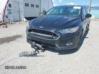 2020 Ford Fusion SE with VIN 3FA6P0HD1LR179527, listed as a IAAI auction lot 39131081 with 108,022 mi miles and . Bid and sale history available at DreamBid. Image 6.