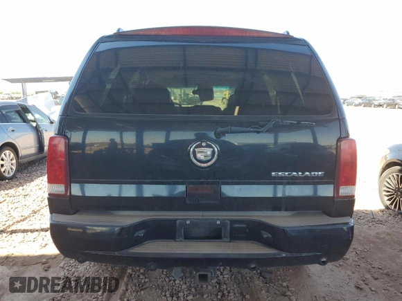 2002 Cadillac Escalade z VIN 1GYEK63N82R329743, wystawiony jako Copart lot #56587295 z przebiegiem 215 694 mil mil oraz Szkoda całkowita • Salvage title. Historia ofert i sprzedaży dostępna na DreamBid. Obrazek 6.