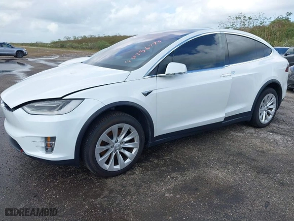 2019 Tesla Model X 75D with VIN 5YJXCBE28KF152415, listed as a IAAI auction lot 40756773 with NaN miles. Bid and sale history available at carsss.com. Image 2.