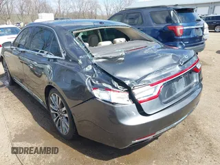 2017 Lincoln Continental Reserve z VIN 1LN6L9RP0H5636532, wystawiony jako IAAI lot #41882280 z przebiegiem 98 733 mil mil oraz . Historia ofert i sprzedaży dostępna na DreamBid. Obrazek 6.