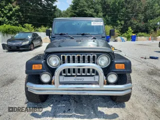 2001 Jeep Wrangler Sport с VIN 1J4FA49S91P347090, выставлен на аукционе Copart как лот 60436405 с пробегом 141 172 миль миль и Списание • Salvage title. История ставок и продаж доступна на DreamBid. Изображение 5.