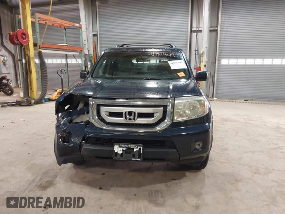 2011 Honda Pilot EX-L with VIN 5FNYF4H52BB038651, listed as a IAAI auction lot 41868695 with 281,683 mi miles. Bid and sale history available at carsss.com. Image 12.