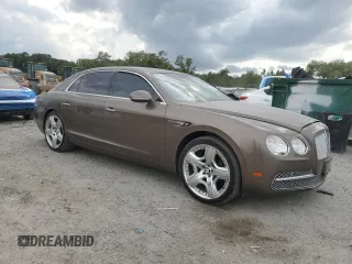 2014 Bentley Flying Spur с VIN SCBEC9ZA9EC091162, выставлен на аукционе Copart как лот 55941855 с пробегом 135 032 миль миль и Списание • Salvage title. История ставок и продаж доступна на DreamBid. Изображение 4.