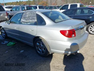 2005 Saturn L with VIN 1G8JD54R95Y503172, listed as a IAAI auction lot 41014580 with 122,932 mi miles. Bid and sale history available at carsss.com. Image 3.