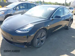 2018 Tesla Model 3 Long Range Battery with VIN 5YJ3E1EA7JF057031, listed as a IAAI auction lot 42139832 with 92,618 mi miles and . Bid and sale history available at DreamBid. Image 19.