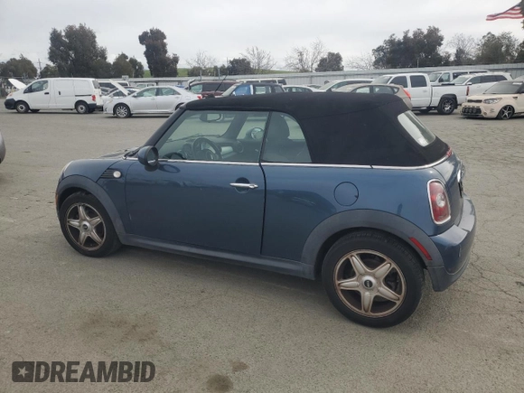2010 MINI Convertible with VIN WMWMR3C52ATU98506, listed as a Copart auction lot 47706195 with 92,804 mi miles and Clean Title. Bid and sale history available at DreamBid. Image 2.