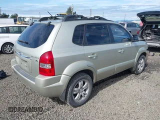 2006 Hyundai Tucson GLS with VIN KM8JN12D26U341568, listed as a IAAI auction lot 41977115 with 155,682 mi miles. Bid and sale history available at carsss.com. Image 4.