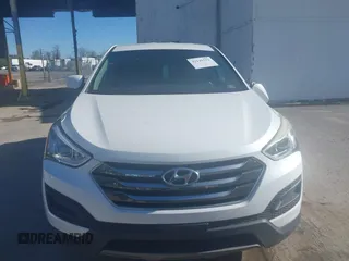 2016 Hyundai Santa Fe z VIN 5XYZTDLB7GG329320, wystawiony jako IAAI lot #42145591 z przebiegiem 106 345 mil mil oraz . Historia ofert i sprzedaży dostępna na DreamBid. Obrazek 12.