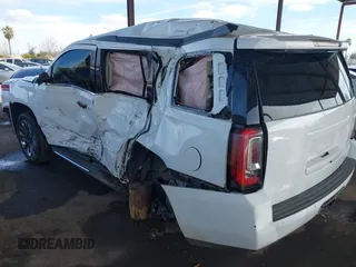 2019 GMC Yukon SLT with VIN 1GKS2BKC5KR109529, listed as a IAAI auction lot 41559860 with 136,025 mi miles. Bid and sale history available at carsss.com. Image 3.