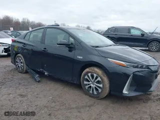 2021 Toyota Prius Prime LE with VIN JTDKAMFP2M3165859, listed as a IAAI auction lot 41943098 with 20,306 mi miles. Bid and sale history available at carsss.com. Image 1.