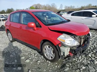 2010 Nissan Versa SL with VIN 3N1BC1CP9AL453748, listed as a Copart auction lot 51468085 with 147,458 mi miles and Salvage title. Bid and sale history available at DreamBid. Image 4.