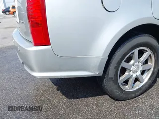 2004 Cadillac SRX with VIN 1GYDE63A740111607, listed as a IAAI auction lot 41918519 with 239,042 mi miles. Bid and sale history available at carsss.com. Image 13.