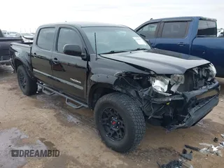 2013 Toyota Tacoma with VIN 5TFLU4EN3DX080999, listed as a IAAI auction lot 41366999 with 126,818 mi miles and . Bid and sale history available at DreamBid. Image 1.