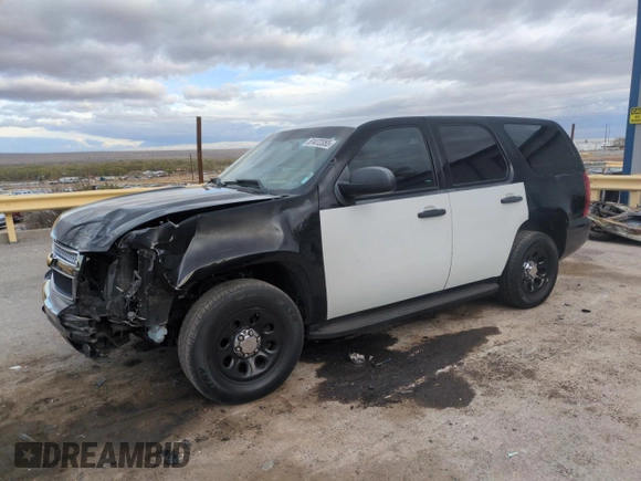 2014 Chevrolet Tahoe Commercial z VIN 1GNLC2E06ER207611, wystawiony jako Copart lot #51472355 z przebiegiem 125 893 mil mil oraz Szkoda całkowita • Salvage title. Historia ofert i sprzedaży dostępna na DreamBid. Obrazek 1.