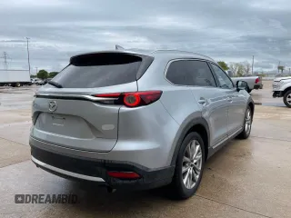 2017 Mazda CX-9 Grand Touring with VIN JM3TCADY7H0136915, listed as a Copart auction lot 51966835 with 135,872 mi miles and Clean title. Bid and sale history available at DreamBid. Image 4.