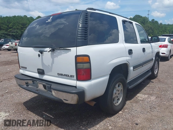 2005 Chevrolet Tahoe LS with VIN 1GNEC13V65R154250, listed as a IAAI auction lot 42633273 with 319,329 mi miles and . Bid and sale history available at DreamBid. Image 4.