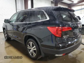2017 Honda Pilot EX-L with VIN 5FNYF6H55HB096659, listed as a Copart auction lot 60426095 with 144,047 mi miles and Salvage title. Bid and sale history available at DreamBid. Image 2.