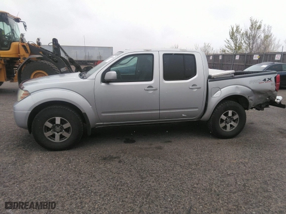 2011 Nissan Frontier PRO-4X with VIN 1N6AD0EV2BC438370, listed as a IAAI auction lot 41952484 with 217,529 mi miles. Bid and sale history available at carsss.com. Image 14.