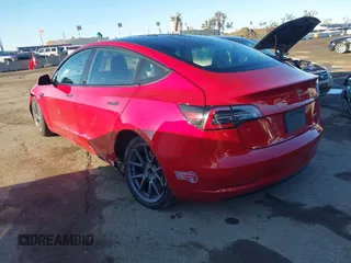 2022 Tesla Model 3 Long Range with VIN 5YJ3E1EB0NF212257, listed as a IAAI auction lot 41735989 with 28,528 mi miles and . Bid and sale history available at DreamBid. Image 3.