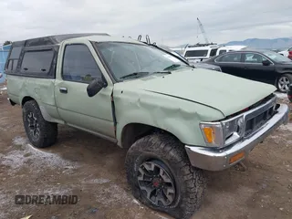 1990 Toyota Pickup DX with VIN JT4RN01P2L7039320, listed as a IAAI auction lot 41103507 with 303,956 mi miles and . Bid and sale history available at DreamBid. Image 1.