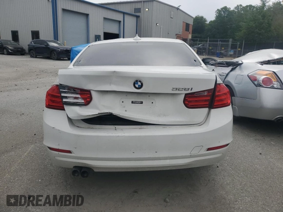 2012 BMW 3 Series 328i с VIN WBA3C1C51CF433150, выставлен на аукционе Copart как лот 52412865 с пробегом Не указан миль и Списание • Salvage title. История ставок и продаж доступна на DreamBid. Изображение 6.