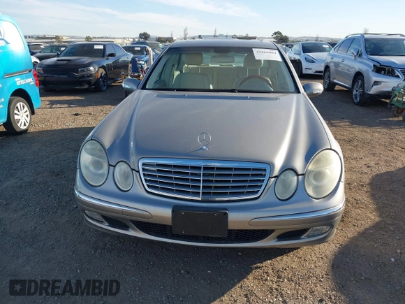 2005 Mercedes-Benz E-Class 3.2L with VIN WDBUF65J05A646577, listed as a IAAI auction lot 41666861 with 106,012 mi miles. Bid and sale history available at carsss.com. Image 12.