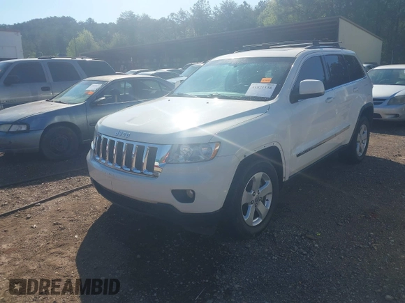 2012 Jeep Grand Cherokee Laredo with VIN 1C4RJEAG5CC106203, listed as a IAAI auction lot 41821138 with 157,474 mi miles. Bid and sale history available at carsss.com. Image 2.
