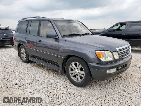 2003 Lexus LX 470 z VIN JTJHT00W033530306, wystawiony jako Copart lot #57162675 z przebiegiem 185 458 mil mil oraz Szkoda całkowita • Salvage title. Historia ofert i sprzedaży dostępna na DreamBid. Obrazek 4.
