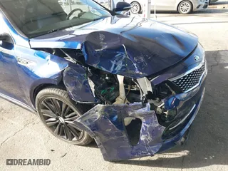 2018 Kia Optima SX with VIN 5XXGV4L29JG208284, listed as a IAAI auction lot 41765005 with 77,189 mi miles. Bid and sale history available at carsss.com. Image 6.