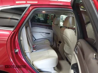 2016 Cadillac SRX Performance Collection z VIN 3GYFNCE32GS571230, wystawiony jako IAAI lot #42417263 z przebiegiem 59 634 mil mil oraz . Historia ofert i sprzedaży dostępna na DreamBid. Obrazek 8.