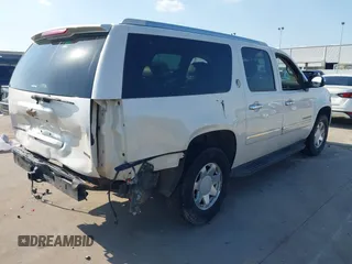 2010 Chevrolet Suburban LTZ with VIN 1GNUCKE06AR277074, listed as a IAAI auction lot 41828184 with 260,839 mi miles. Bid and sale history available at carsss.com. Image 4.