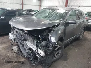 2018 Honda CR-V EX with VIN 7FARW2H56JE043542, listed as a IAAI auction lot 41560270 with 104,237 mi miles and . Bid and sale history available at DreamBid. Image 2.