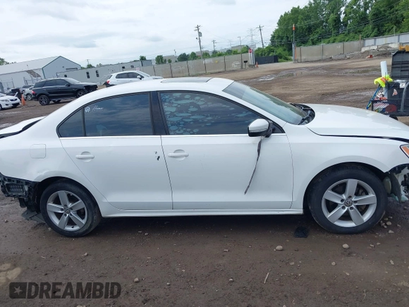 2013 Volkswagen Jetta TDI w/Premium/Nav with VIN 3VWLL7AJ3DM418377, listed as a IAAI auction lot 42768223 with 149,241 mi miles and . Bid and sale history available at DreamBid. Image 14.