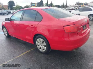 2014 Volkswagen Jetta Sedan SE with VIN 3VWD17AJ4EM293336, listed as a IAAI auction lot 41788438 with 138,128 mi miles. Bid and sale history available at carsss.com. Image 3.