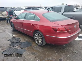 2013 Volkswagen CC VR6 Executive 4Motion with VIN WVWGU7AN9DE561506, listed as a IAAI auction lot 41459074 with 70,128 mi miles. Bid and sale history available at carsss.com. Image 3.