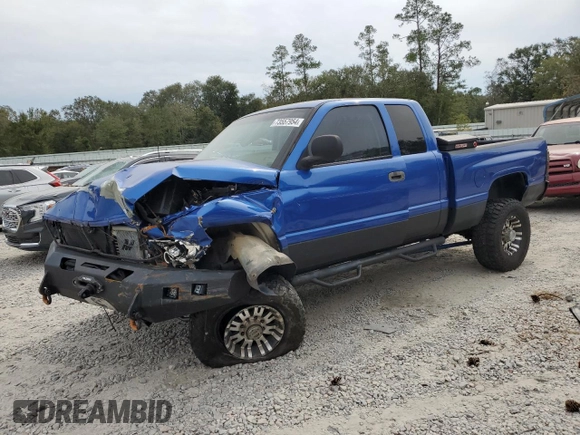 1999 Dodge Ram 2500 with VIN 1B7KF2363XJ504002, listed as a Copart auction lot 73557954 with 297,618 mi miles and Salvage Title. Bid and sale history available at carsss.com. Image 1.