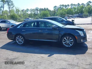 2014 Cadillac XTS Luxury z VIN 2G61M5S37E9211547, wystawiony jako IAAI lot #42373128 z przebiegiem 146 354 mil mil oraz . Historia ofert i sprzedaży dostępna na DreamBid. Obrazek 13.