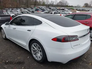 2016 Tesla Model S 90D with VIN 5YJSA1E26GF155962, listed as a IAAI auction lot 41348998 with 134,269 mi miles and . Bid and sale history available at DreamBid. Image 14.
