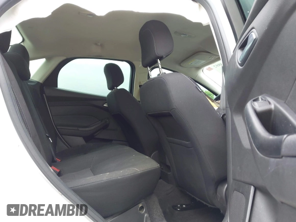 2018 Ford Focus SE z VIN 1FADP3F21JL257262, wystawiony jako IAAI lot #42174952 z przebiegiem 138 872 mil mil oraz . Historia ofert i sprzedaży dostępna na DreamBid. Obrazek 8.